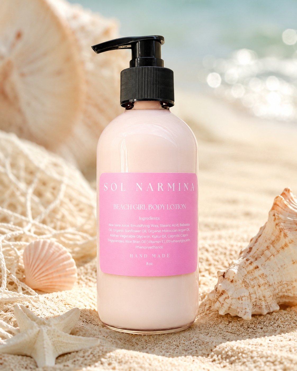 Sol Narmina Beach Girl Body Lotion standing on sand with seashells