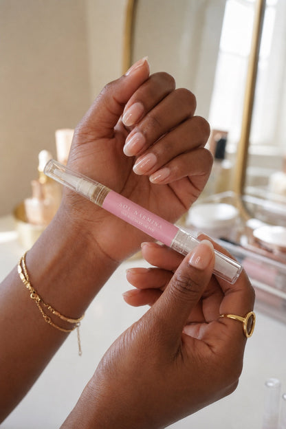 Sol Narmina Nail & Cuticle Oil Pen held in hand with manicured nails